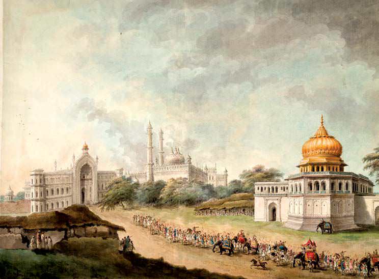 An elephant procession passing the Sunehri Burj as it approaches the Rumi Darwaza gateway to the Imambara