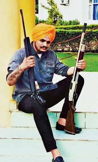 Two Singers Booked For Promoting Gun Culture