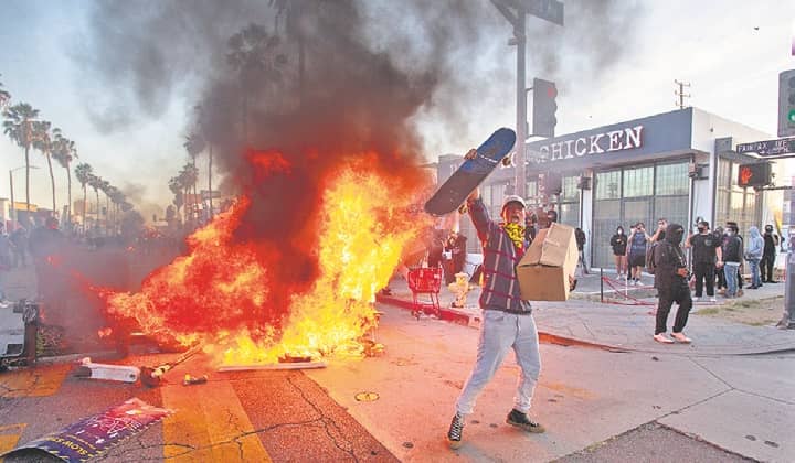 Dozen More US Cities Under Curfew