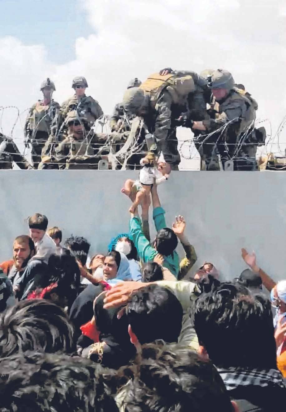 Baby handed to US soldier amid Kabul airport chaos still missing