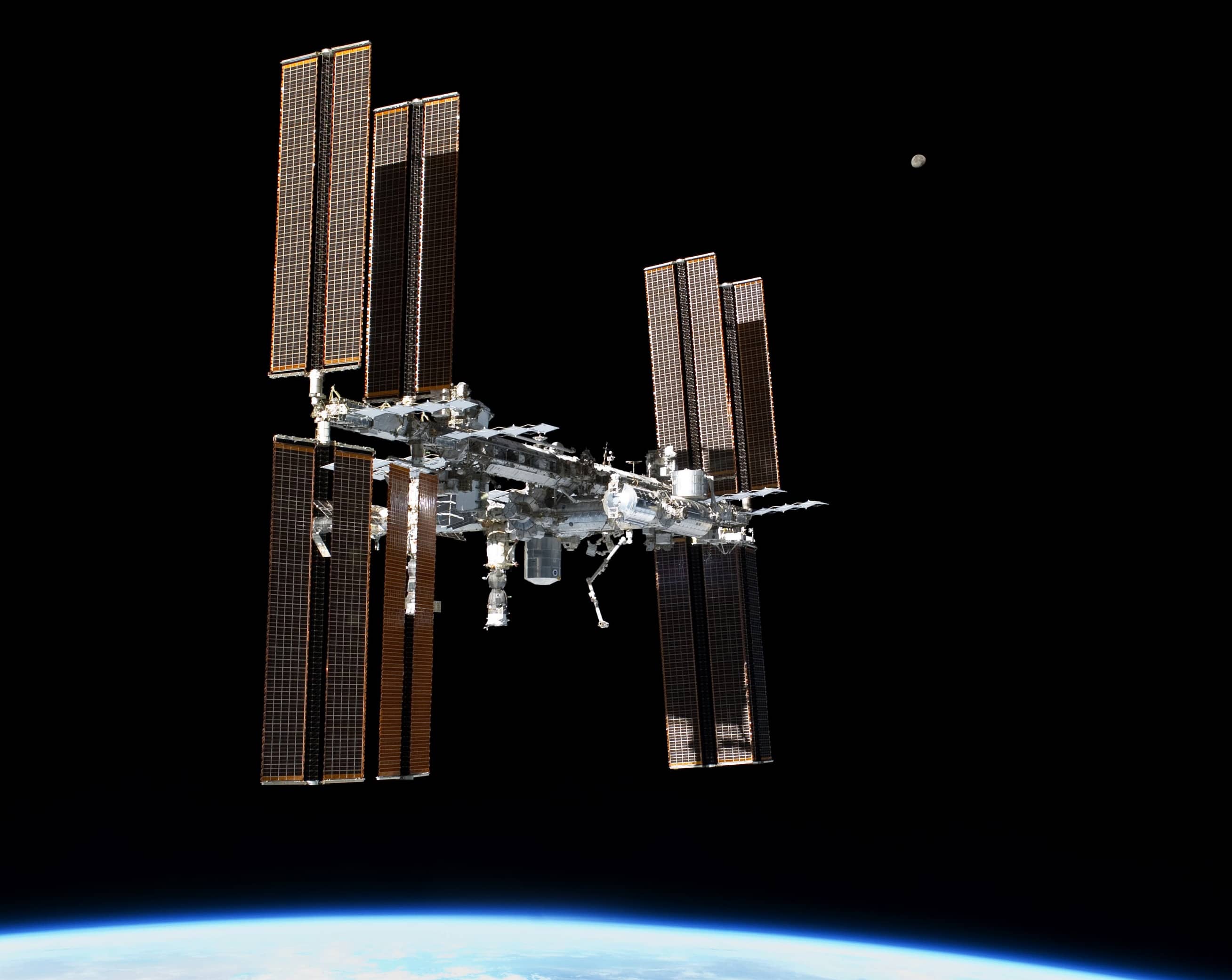 2 Russians Venture Into Open Space From Space Station