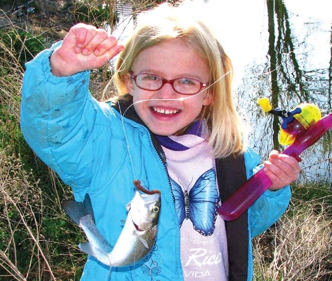 Sweet joy of a child's first fish